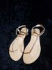 Picture of Chic Gold Colored Slippers - Perfect for Relaxing in Style!